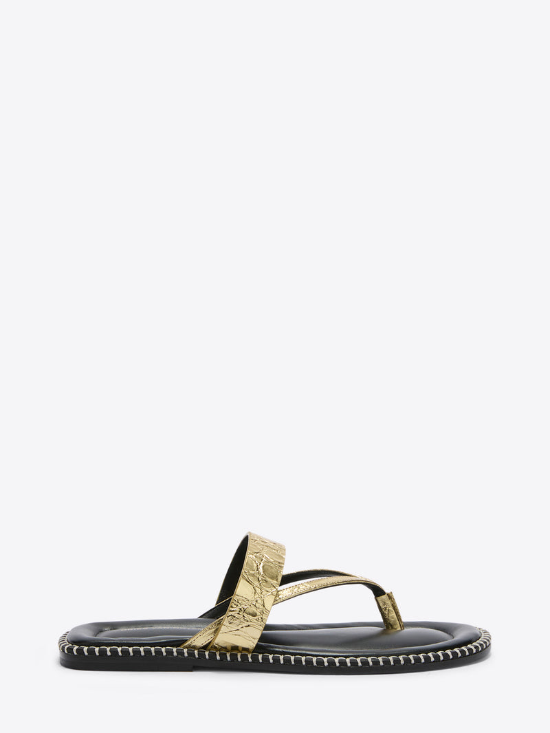 Gold and black sandal on a white background - Dries Van Noten