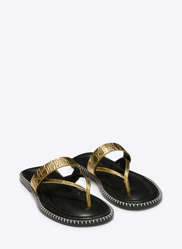 Black sandals with gold straps on a white background - Dries Van Noten