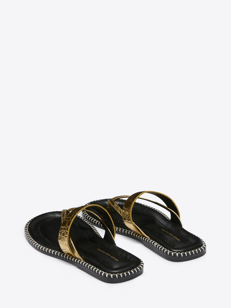 Black sandals with gold straps on a white background - Dries Van Noten