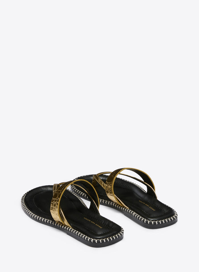 Black sandals with gold straps on a white background - Dries Van Noten