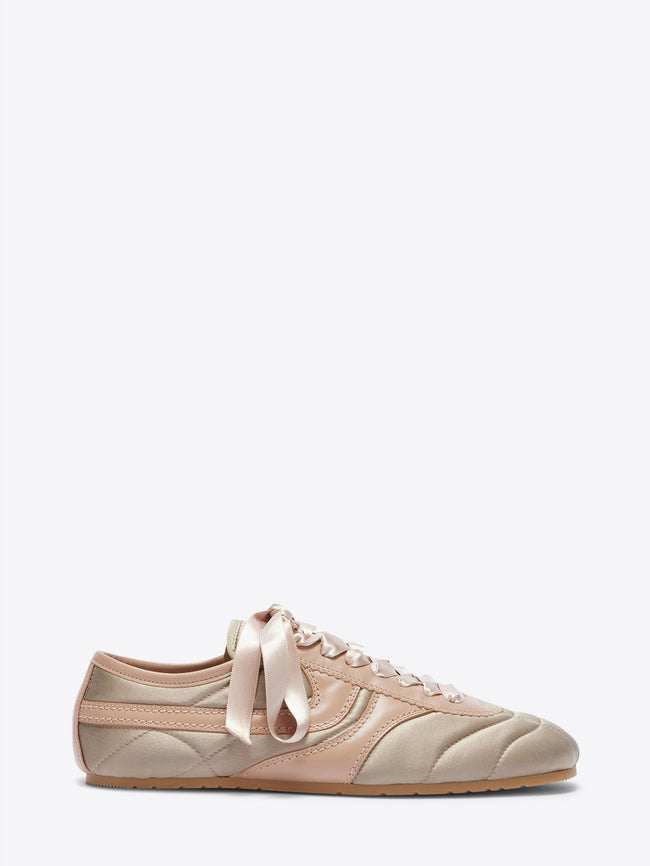 Pink sneaker with ribbon on a white background - Dries Van Noten