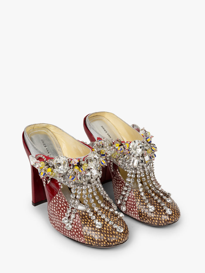 Decorative high-heeled shoes with gemstones on a white background - Dries Van Noten