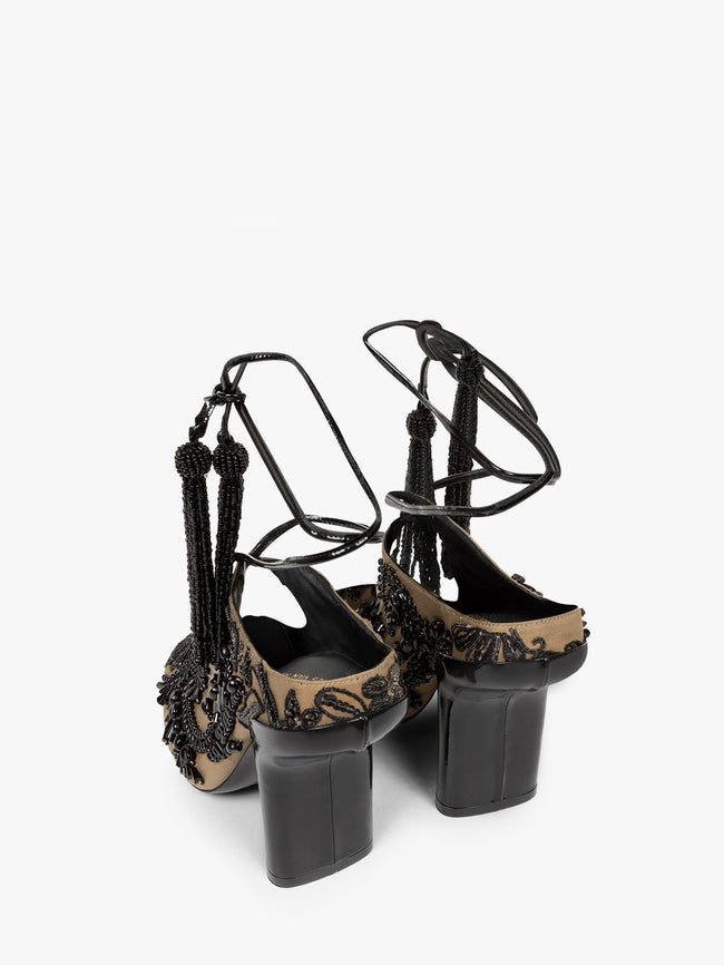 Black and gold high-heeled sandals with intricate designs on a white background - Dries Van Noten