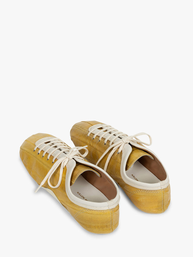 Pair of mustard yellow sneakers with white laces on a white background - Dries Van Noten