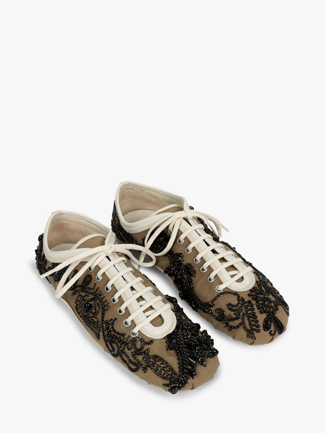 Pair of lace-up shoes with black floral patterns on a white background - Dries Van Noten