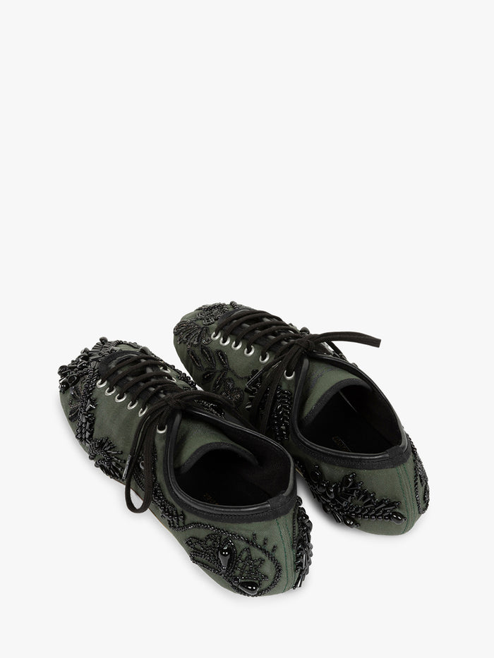 Pair of black lace-up shoes with decorative elements on a white background - Dries Van Noten