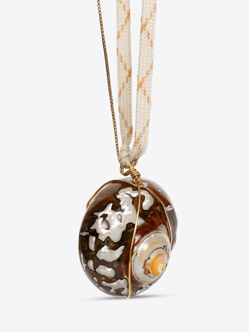 Necklace with a decorative pendant on a white background