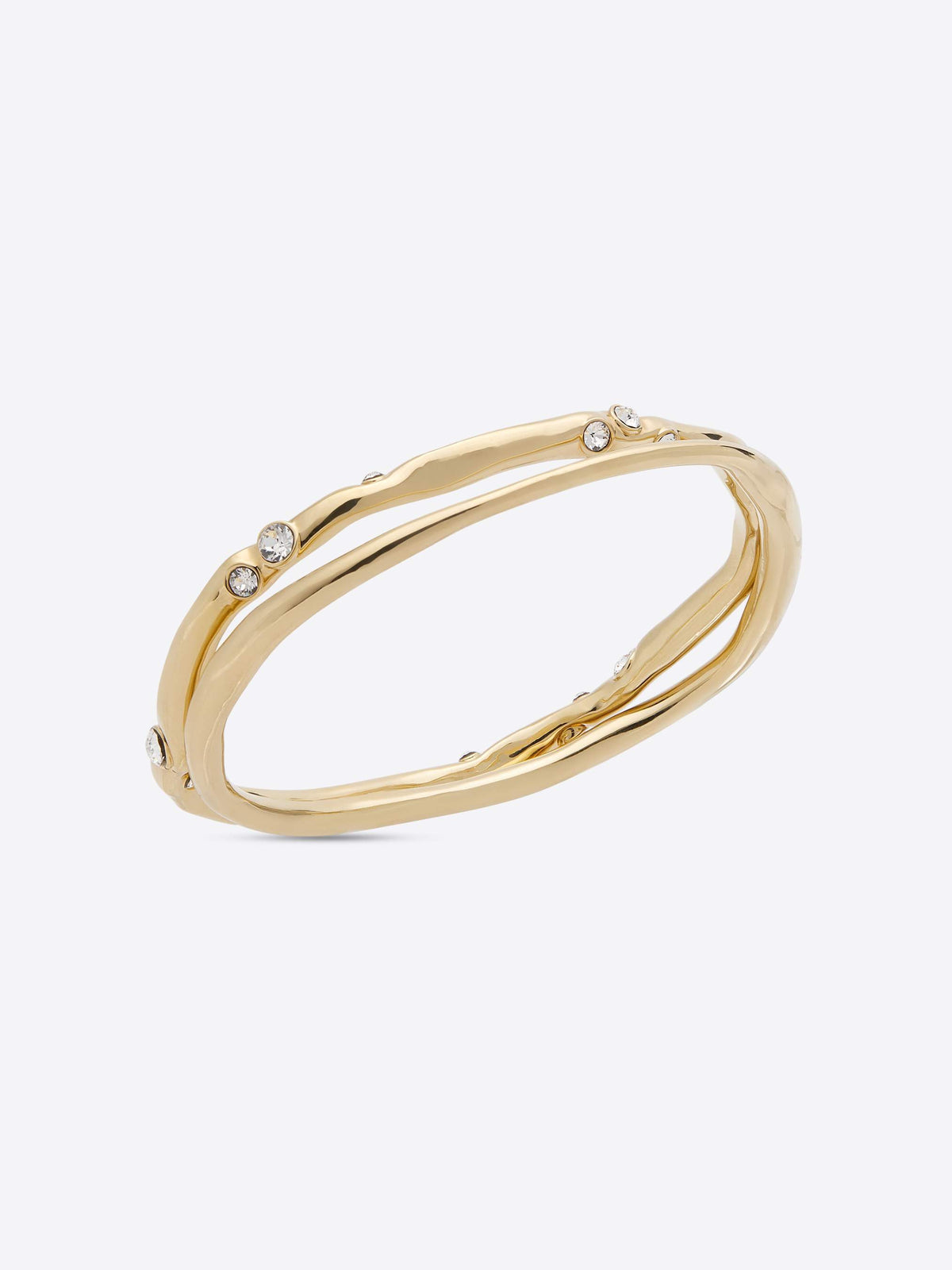 Gold bracelet with small stones on a white background - Dries Van Noten