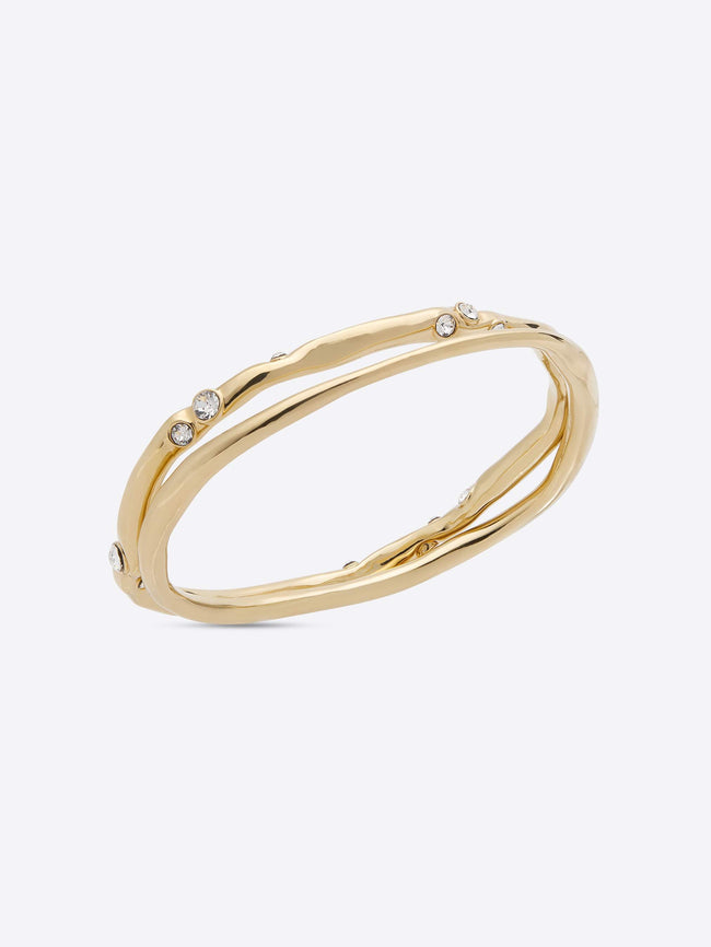 Gold bracelet with small stones on a white background - Dries Van Noten