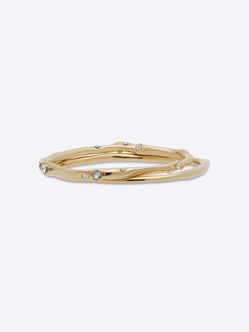 Gold bracelet with small diamonds on a white background - Dries Van Noten