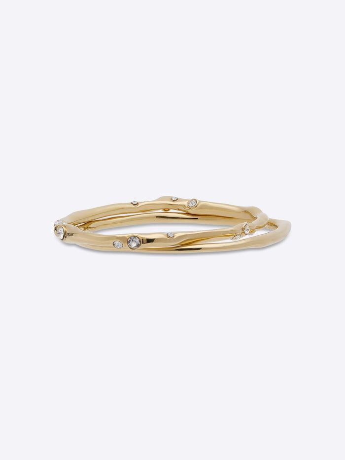 Gold bracelet with small diamonds on a white background - Dries Van Noten