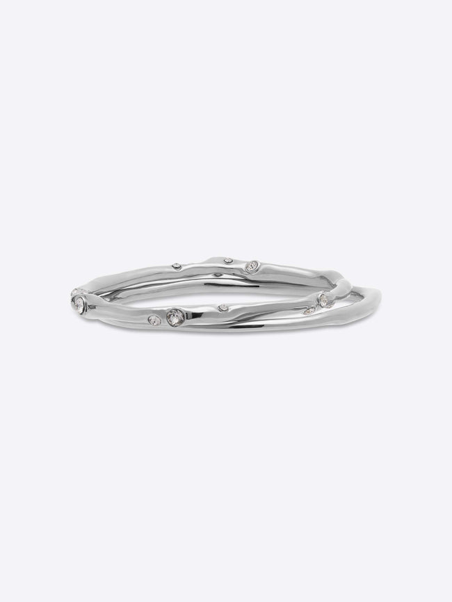 Silver bracelet with small diamonds on a white background - Dries Van Noten
