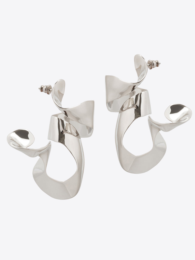 Pair of silver earrings on a white background - Dries Van Noten