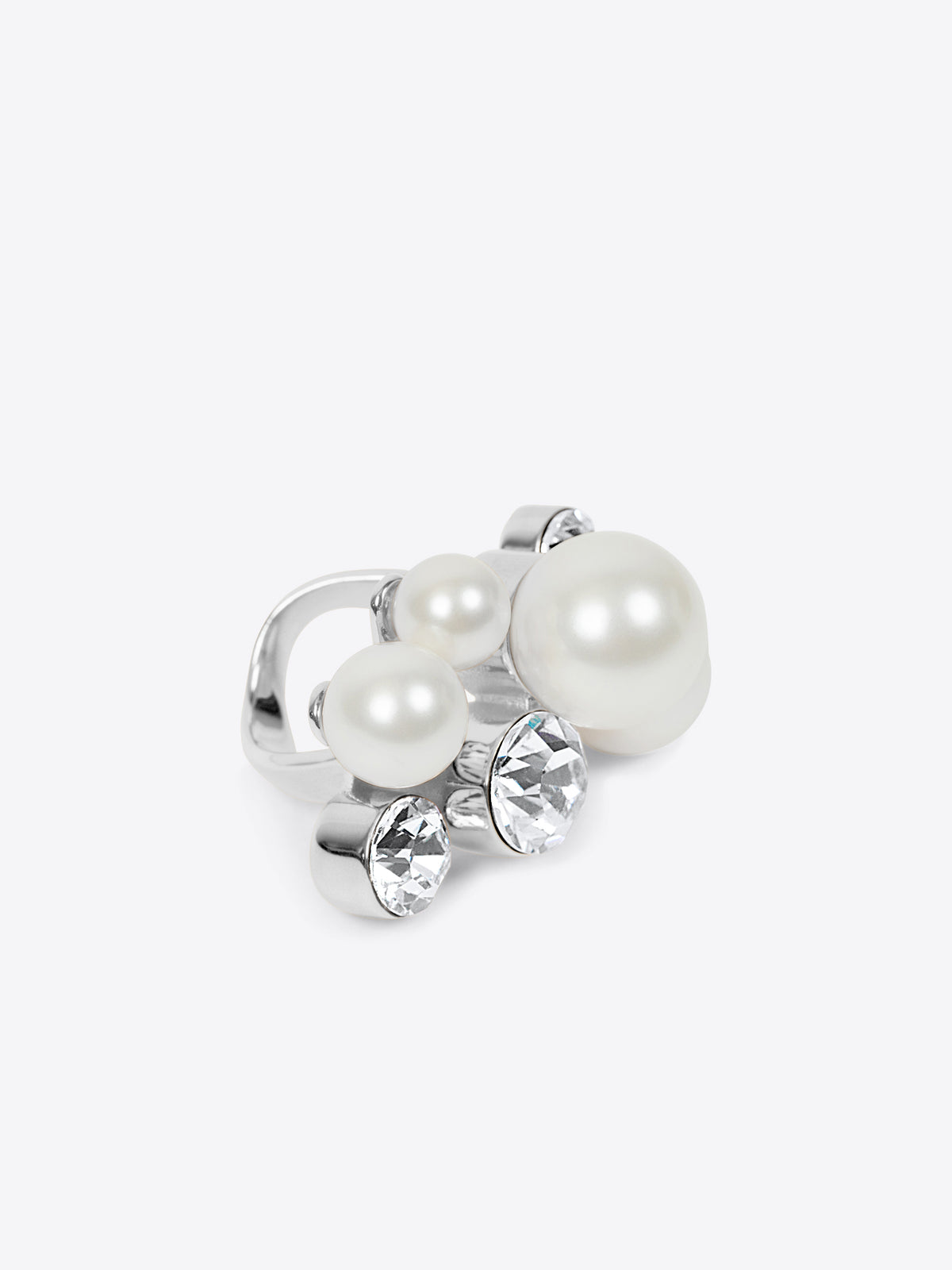 Silver ring with pearls and crystals on a white background