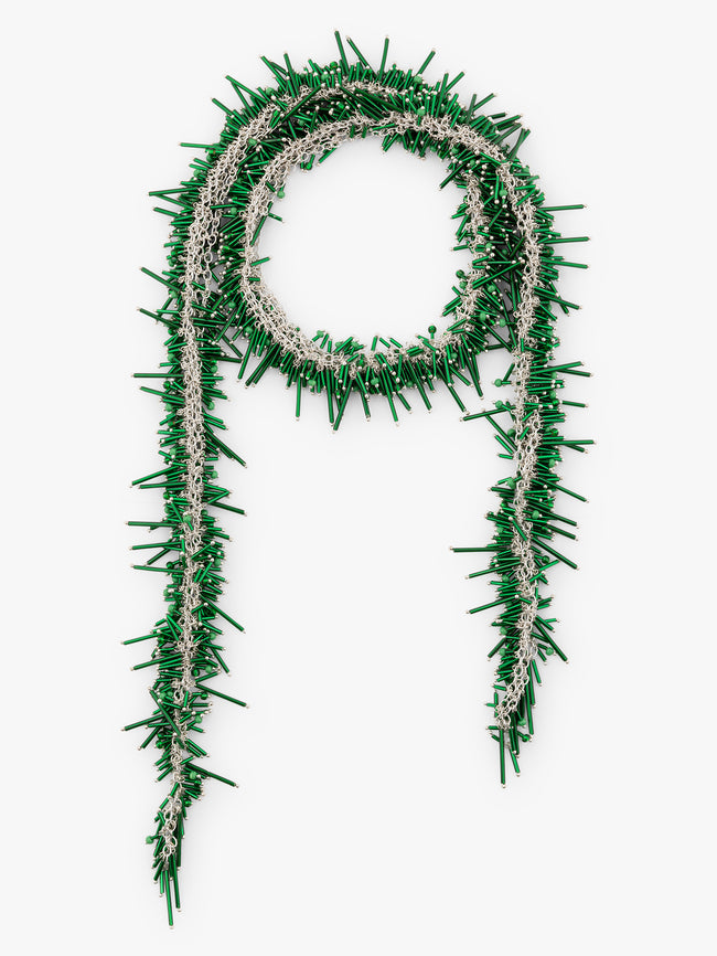 Green decorative garland with silver accents on a white background - Dries Van Noten