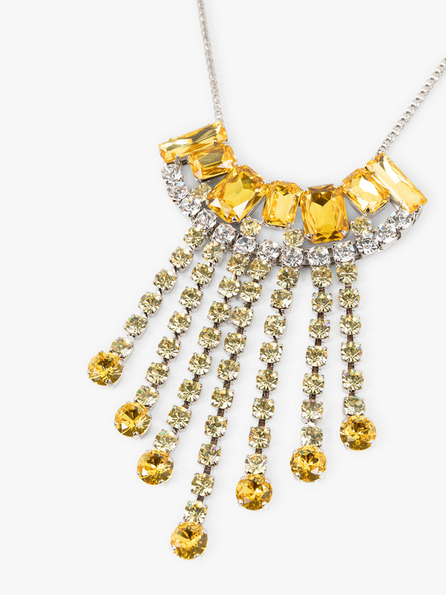 Elegant necklace with yellow gemstones on a white background - Dries Van Noten