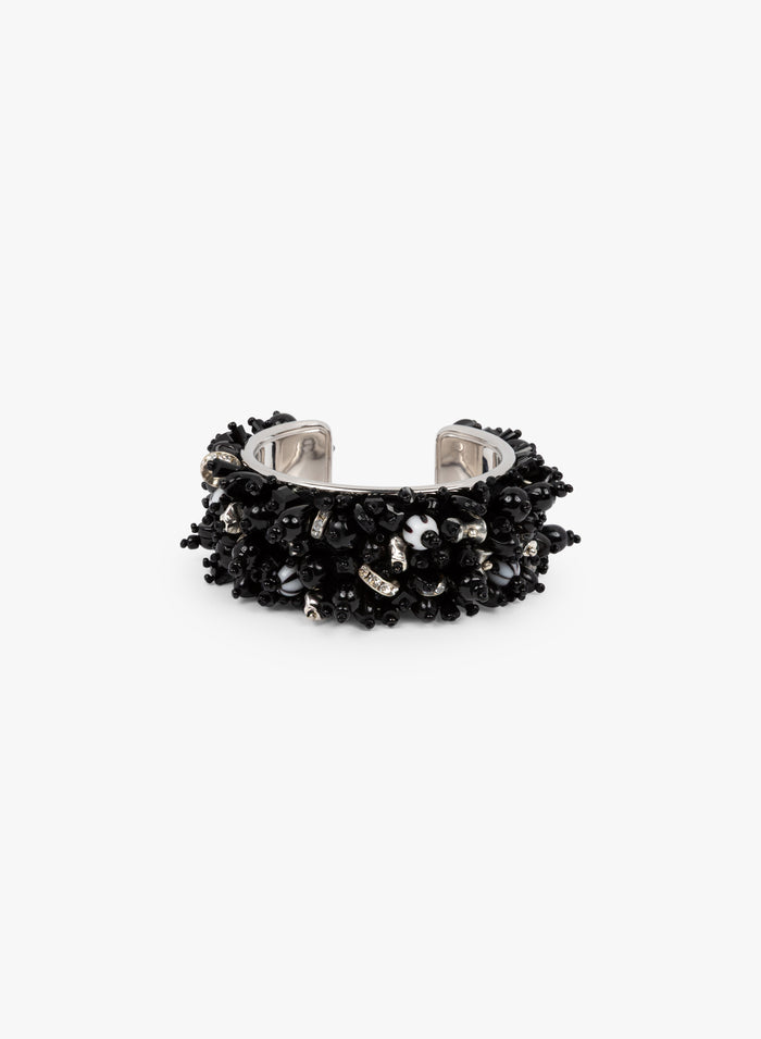 Black studded ring on a white background - Dries Van Noten
