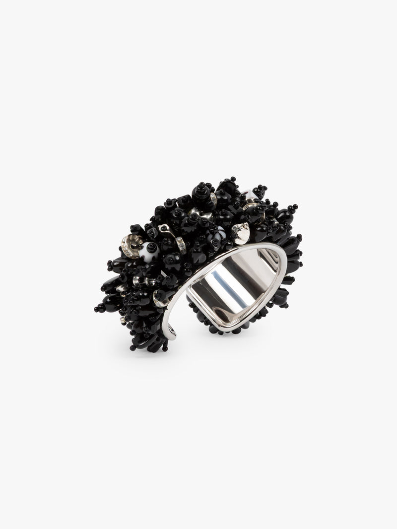 Silver ring with black gemstone cluster on a white background - Dries Van Noten