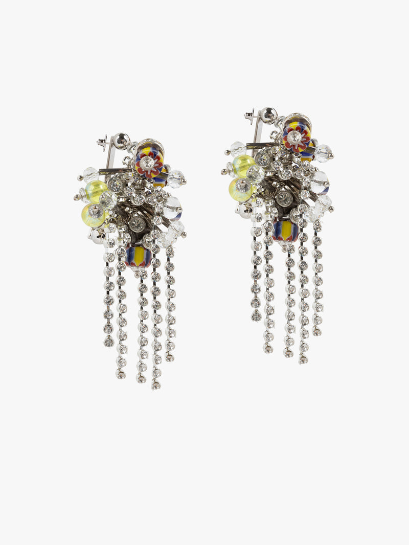 Pair of ornate earrings with dangling elements on a white background - Dries Van Noten
