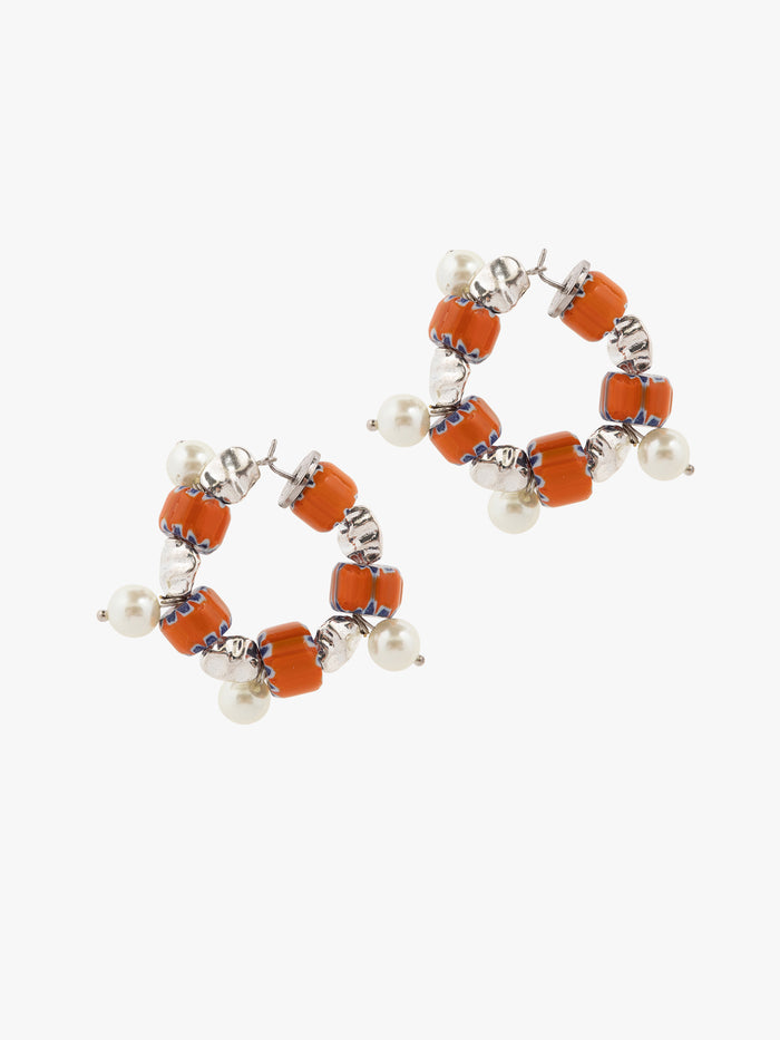 Pair of hoop earrings with orange beads and pearls on a white background - Dries Van Noten