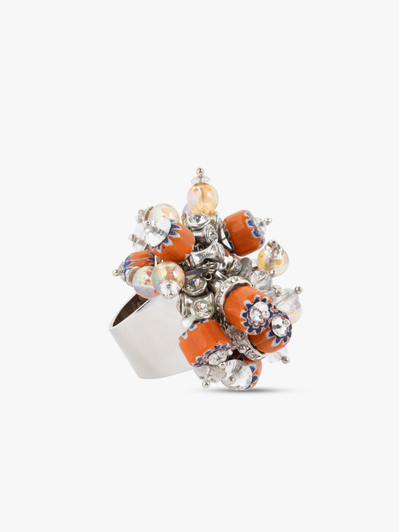 Decorative ring with orange and silver design on a white background - Dries Van Noten