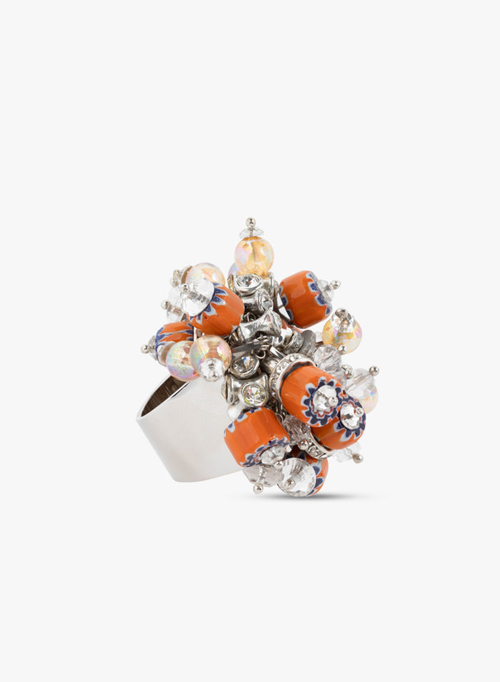 Decorative ring with orange and silver design on a white background - Dries Van Noten