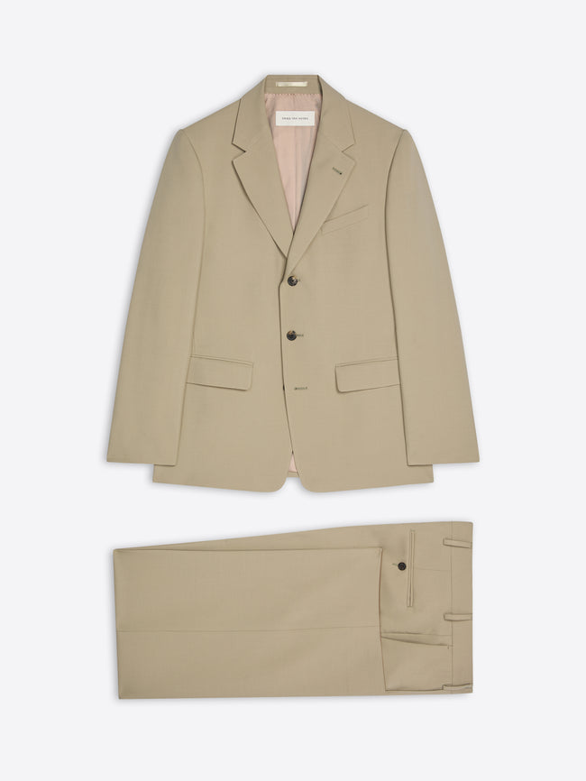 Beige suit jacket and pants on a light beige background