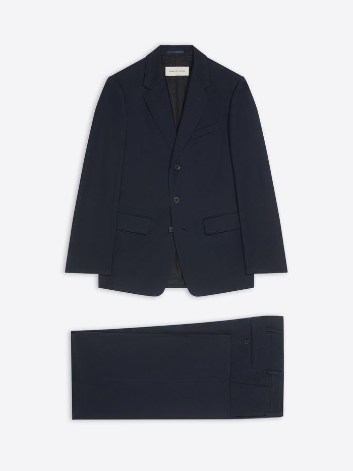 Navy blue suit jacket and pants on a white background
