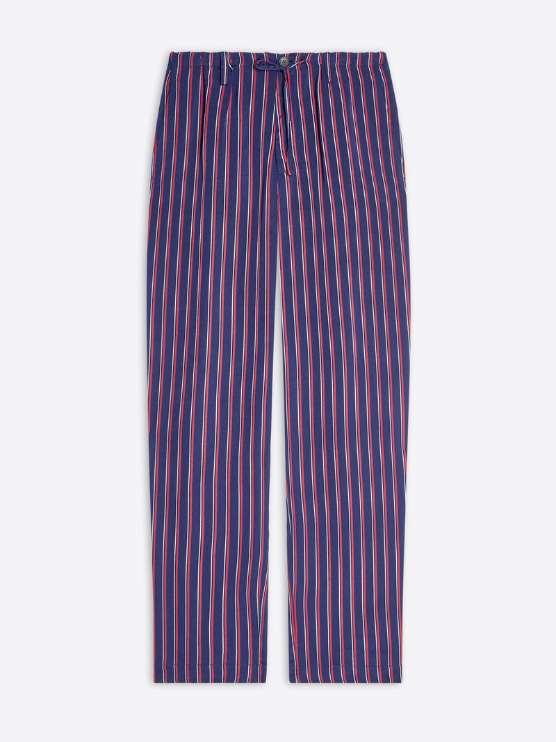 Striped pants with red and blue stripes on a white background - Dries Van Noten