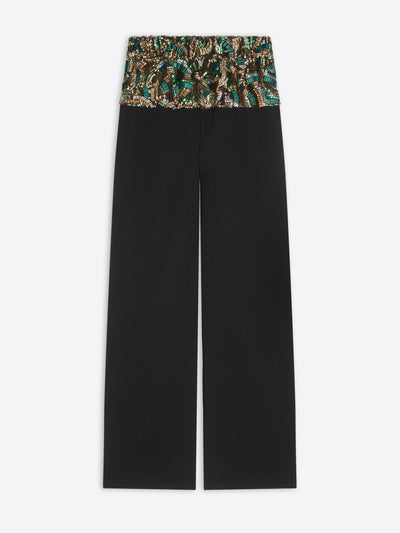 Black pants with patterned waistband on a white background - Dries Van Noten