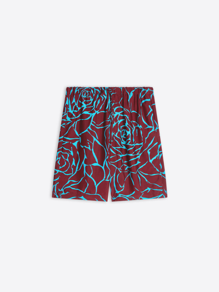 Maroon shorts with blue floral pattern on a white background - Dries Van Noten