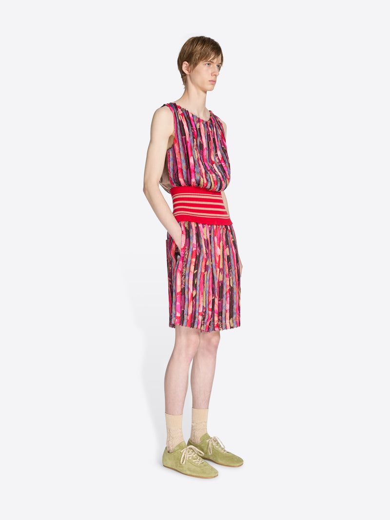 Person wearing a colorful set with a white background - Dries Van Noten