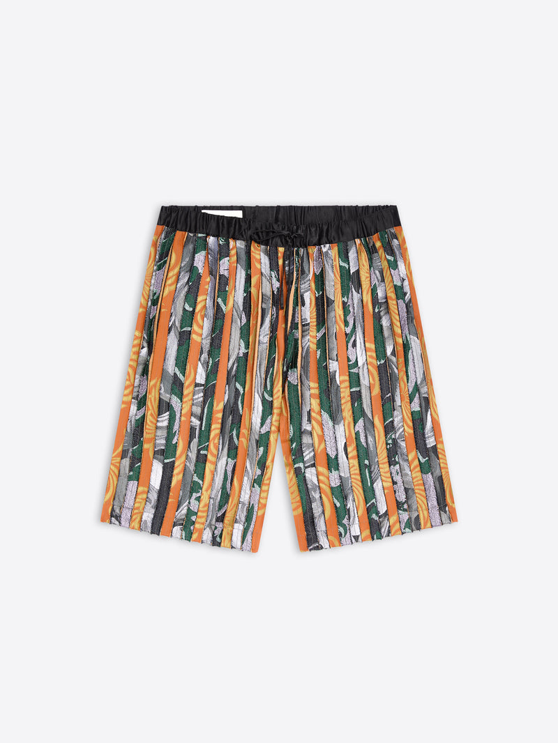 Patterned shorts with orange accents on a white background