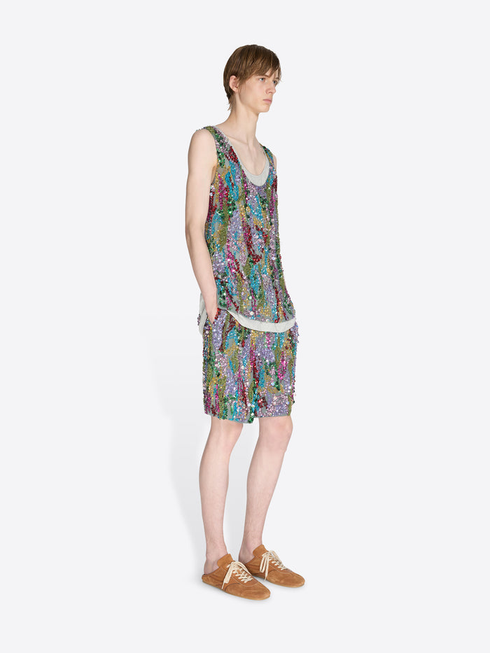 Person wearing a colorful sleeveless dress on a white background - Dries Van Noten