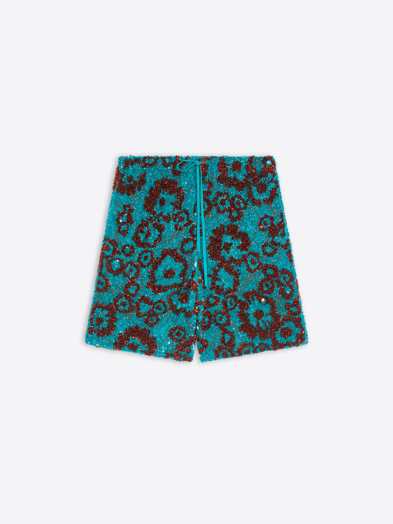 Turquoise shorts with red pattern on a white background - Dries Van Noten