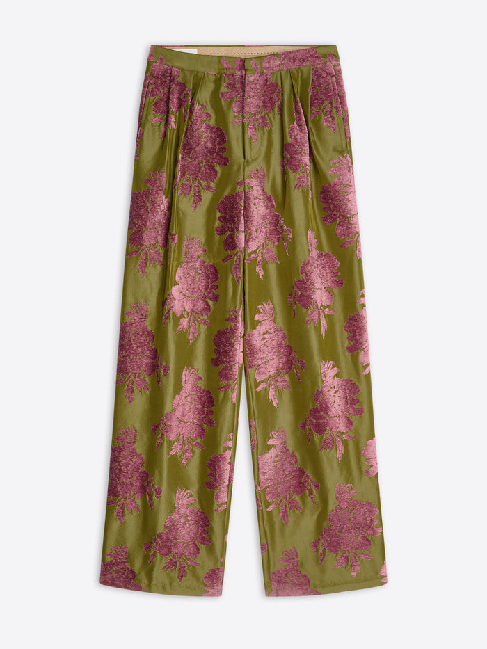 Green pants with pink floral pattern on a white background