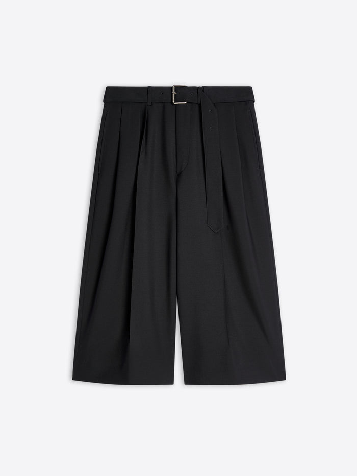 Black pleated pants on a white background