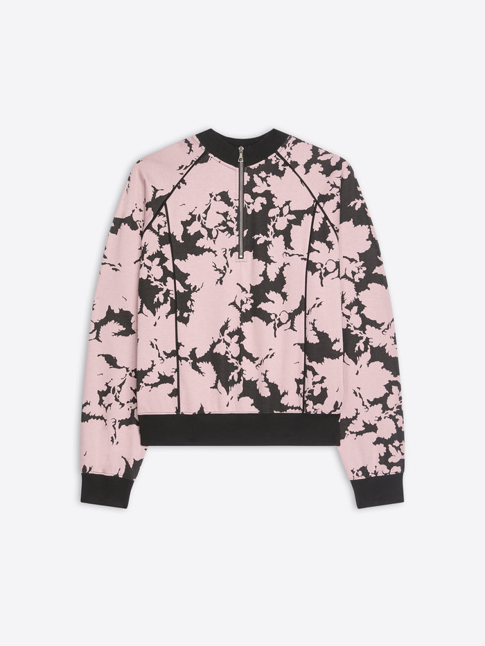 Pink and black floral patterned jacket on a white background