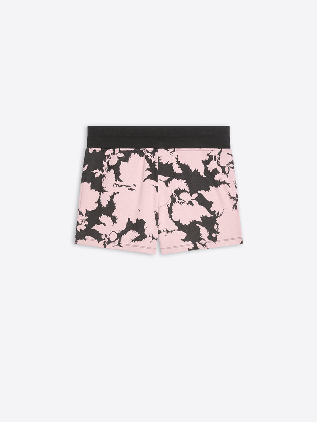 Pink and black floral shorts on a white background