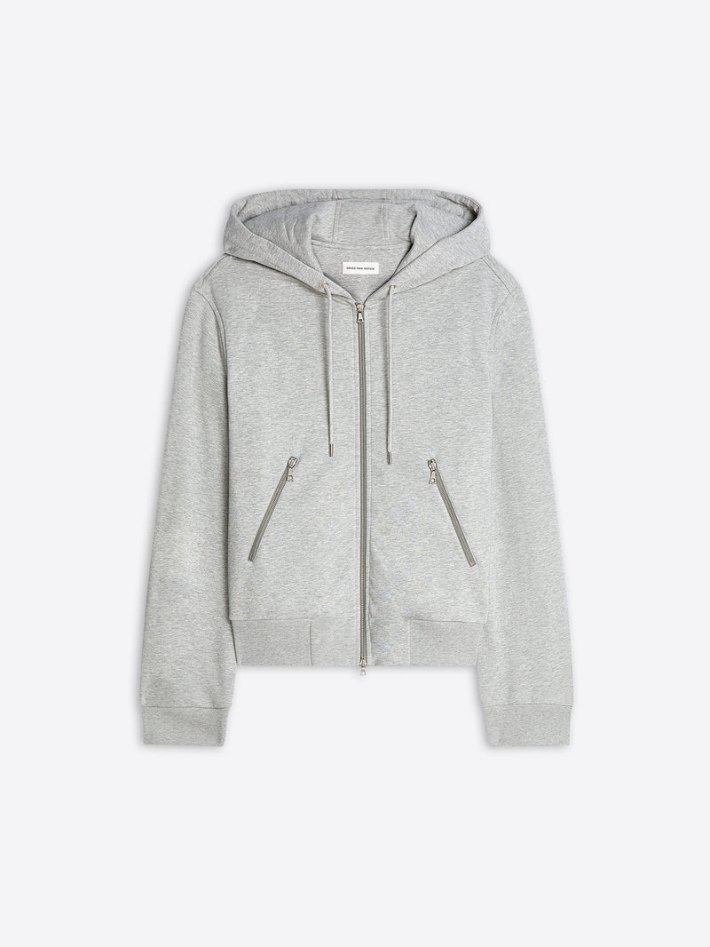 Gray hoodie with zippers on a white background
