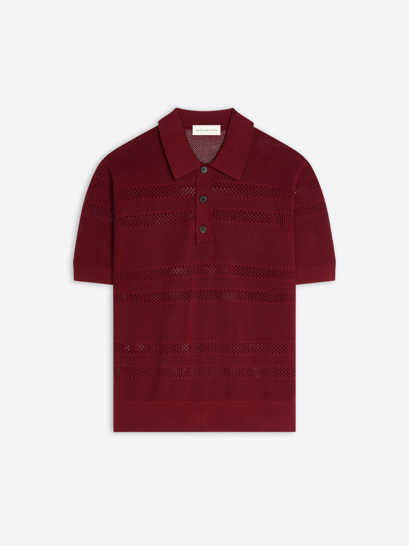 Red knitted polo shirt on a white background