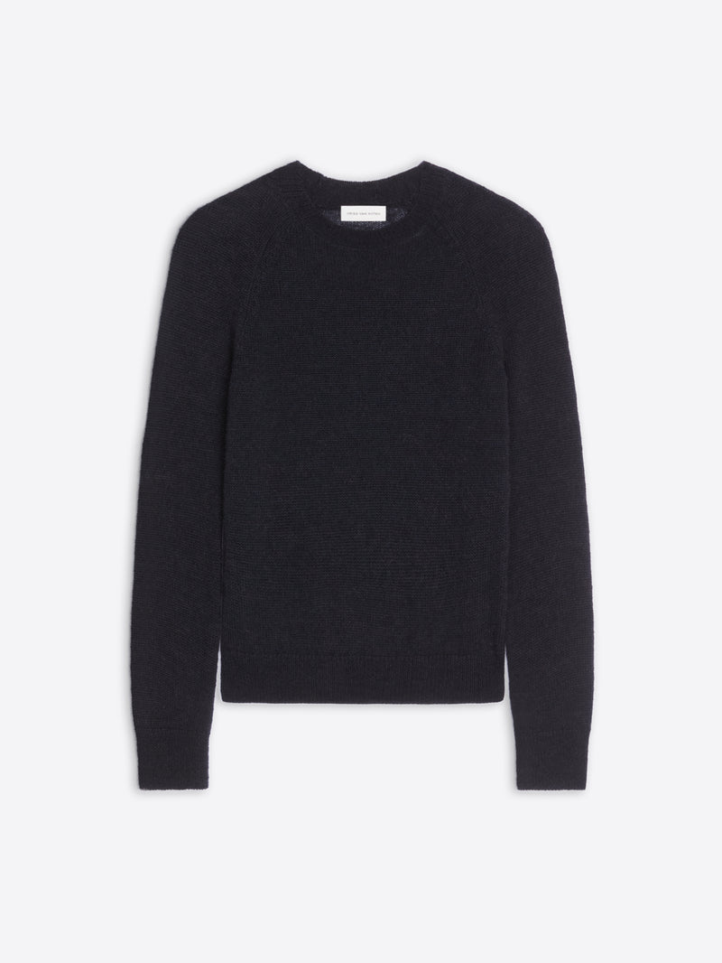 Black sweater on a light gray background