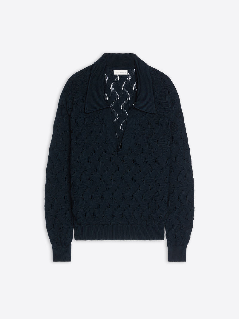 Black sweater with a textured pattern on a white background