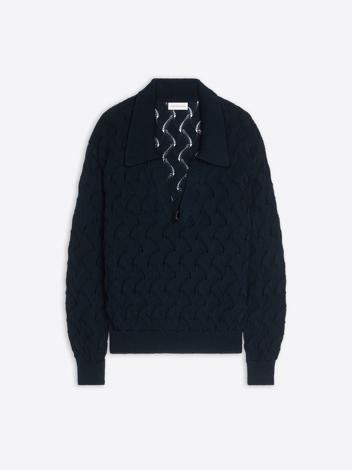 Black sweater with a textured pattern on a white background