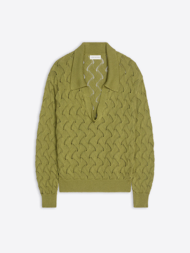 Green sweater with a textured pattern on a white background