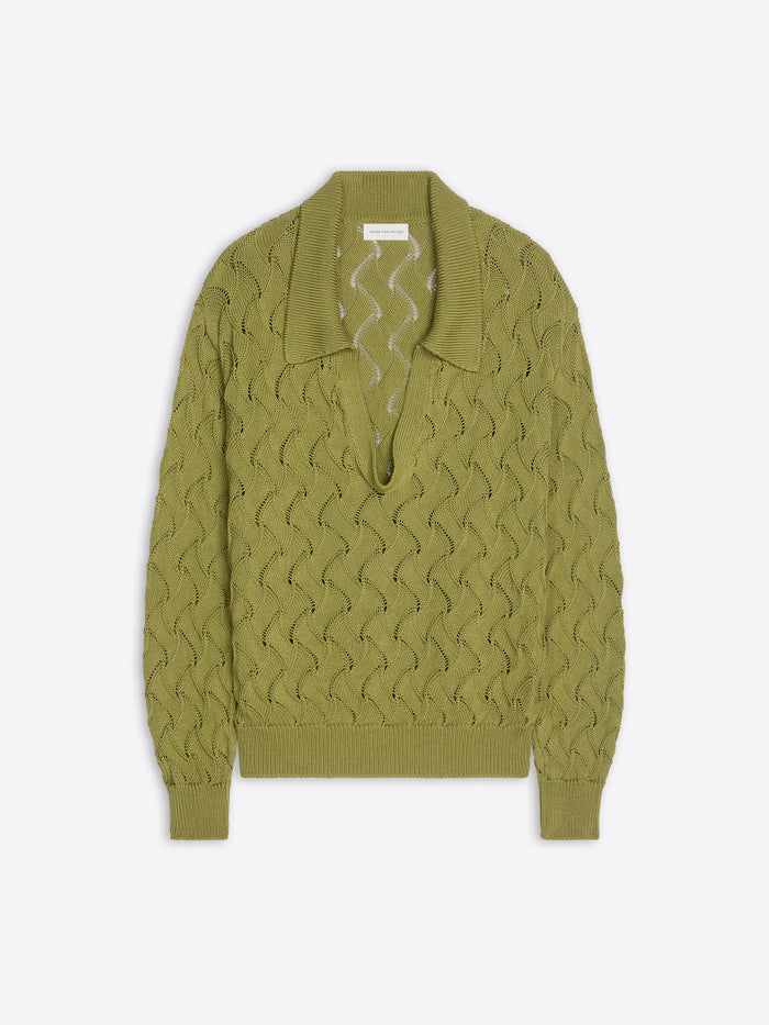 Green sweater with a textured pattern on a white background