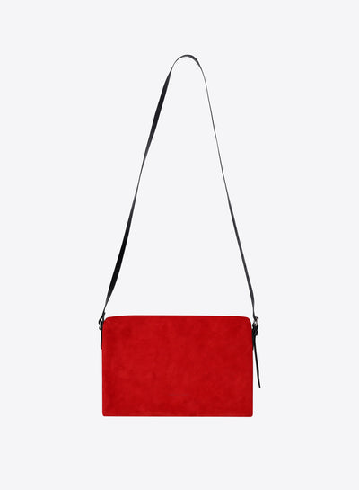 Red handbag with a black strap on a white background - Dries Van Noten