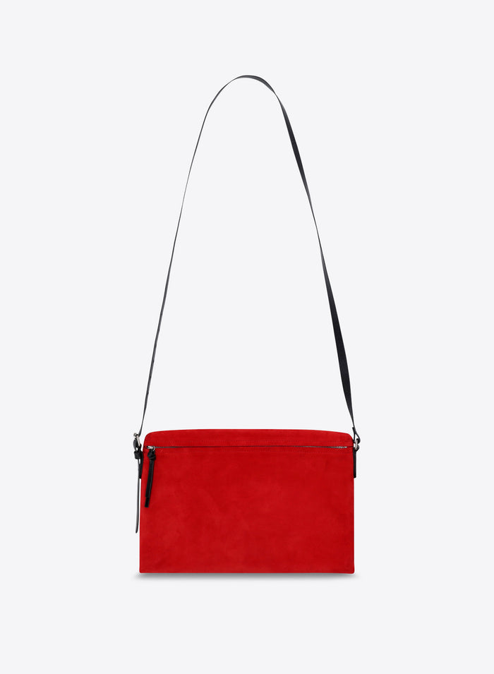 Red handbag with a black strap on a white background - Dries Van Noten