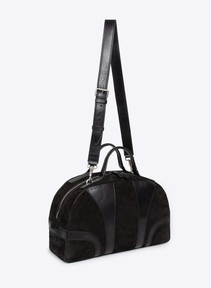 Black leather handbag with a strap on a white background - Dries Van Noten