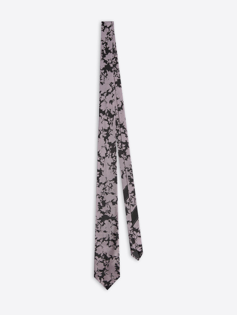 Floral patterned tie on a white background